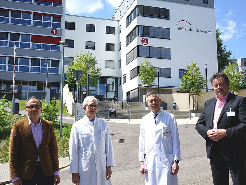 Bernd Mege, Prof. Dr. Marcus Unger, Dr. Thomas Vaterrodt, Verwaltungsdirektor Dr. phil. Martin Huppert auf dem Sonnenberg